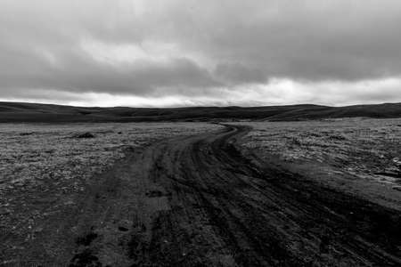 road on the lava plains of the Askja stratovolcano located in Iceland north of the Vatnajokull glacierの写真素材