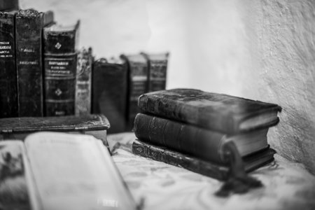 close up of ancient books with leather cover and gold lettering in Cuzco Inca city in Peruの写真素材