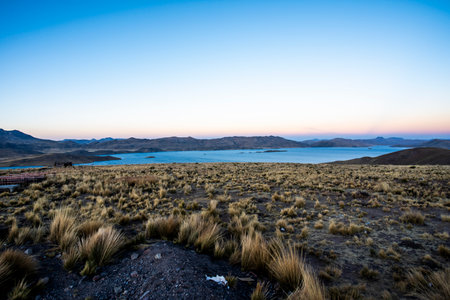panorama of Lake Umayo and grasslands at the village of Puno on Lake Titicaca with views of the...