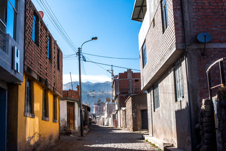 road between the houses of the small village among the peaks of the Andes in the province of Arequipa Peruの写真素材
