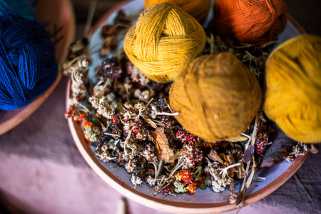 balls of Inca Alpaca wool dyed with natural processes and natural herbs such as purple corn and the...