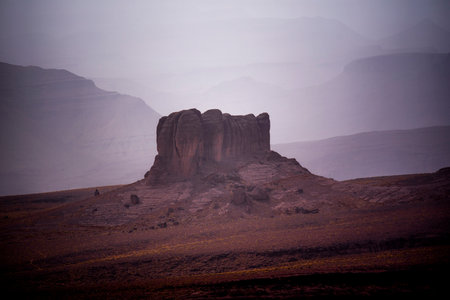 panorama of the Moroccan Atlas mountain peaks with desert valleys and orange rocks among the Berber trails in Jebel Saghro near Ouarzazate Marrakech in Moroccoの写真素材