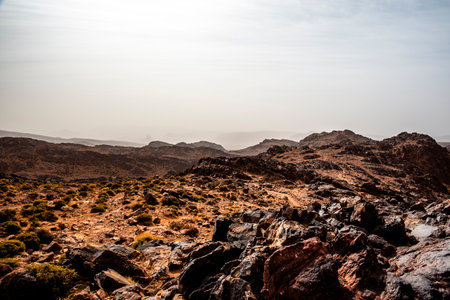 rocky trail between the mountain peaks of the Moroccan Atlas with desert valleys among the Berber lands in Jebel Saghro near Ouarzazate in Marrakech in Moroccorocky trail between the mountain peaks of the Moroccan Atlas with desert valleys among the Berber lands in Jebel Saghro near Ouarzazate in Marrakech in Moroccoの写真素材