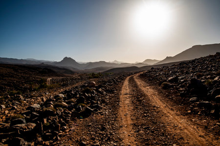 panorama of volcanic mountains and plains and plateaus the peaks and rocks of the south atlas...