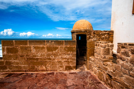 Typical Moroccan architecture in the fortified city of Essaouira with its port and crenellated walls, brick or whitewashed buildings on the Atlantic Ocean coast in Moroccoの写真素材
