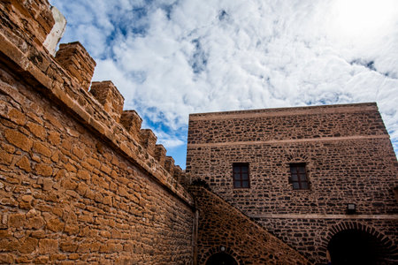 Typical Moroccan architecture in the fortified city of Essaouira with its port and crenellated...
