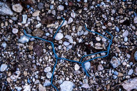 twisted cables form asymmetrical figures