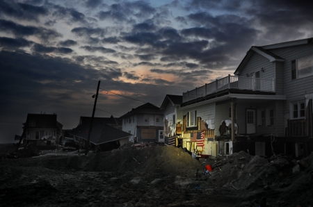 QUEENS, NY - NOVEMBER 11: Damaged houses without power at night in the Rockaway beach - Bel Harbor area due to impact from Hurricane Sandy in Queens, New York, U.S., on November 11, 2012.  のeditorial素材