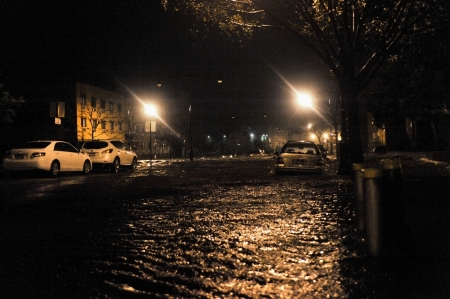 BROOKLYN, NY - OCTOBER 29: Flooded cars, caused by Hurricane Sandy, are seen on October 29, 2012, in the corner of Brigham street and  Emmons Avenue of Brooklyn NY, United States. Hurricane Sandy, which threatens 50 million people in the eastern third of のeditorial素材
