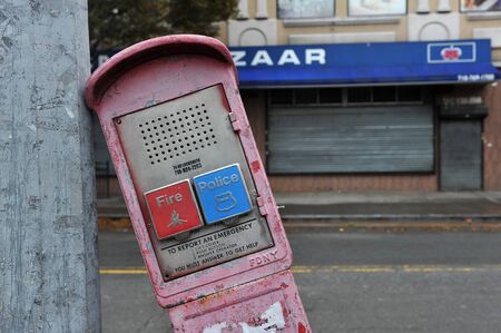 BROOKLYN, NY - OCTOBER 29: Broken Police and fire emergency call phone in the Sheapsheadbay...