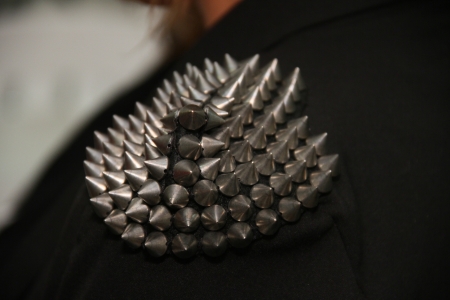 NEW YORK, NY- FEBRUARY 07: A model gets ready  backstage in leather jacket with metallic spikes at the Elliott Evan Collection âNever Foreverâ for F/W 2013 during Mercedes-Benz Fashion Week on February 07, 2013 in NYC.のeditorial素材