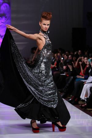 NEW YORK - FEBRUARY 17:  A Model walks on the Lourdes Atencio fashion runway at The New Yorker Hotel during Couture Fashion Week on February 17, 2013 in New York City のeditorial素材