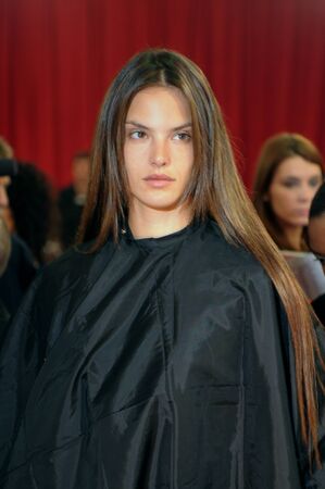 NEW YORK - NOVEMBER 10: Victoria's Secret model  Alexandra Ambrosio getting ready backstage  during the 2010 Victoria's Secret Fashion Show on November 10, 2010 at the Lexington Armory in New York City. のeditorial素材