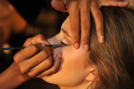 NEW YORK, NY - SEPTEMBER 05: A model gets ready backstage at the DL 1961 Premium Denim spring 2013 fashion show during Mercedes-Benz Fashion Week at Pier 57 on September 5, 2012 in New York City. のeditorial素材
