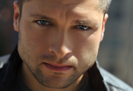 Male actor headshot showing action movie charackterの写真素材