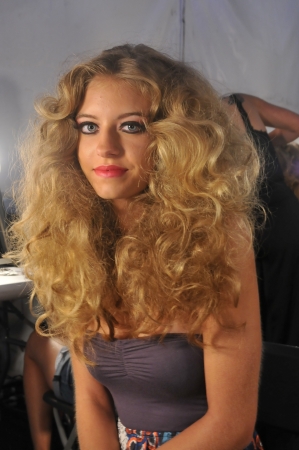 MIAMI - JULY 19: Model gets ready backstage at the Lisa Blue Collection for Spring/ Summer 2013 during Mercedes-Benz Swim Fashion Week on July 19, 2012 in Miami, FL のeditorial素材