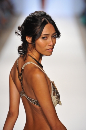 MIAMI - JULY 22: Model walks runway at the Sauvage Collection for Spring/ Summer 2014 during Mercedes-Benz Swim Fashion Week on July 22, 2013 in Miami, FL 
のeditorial素材