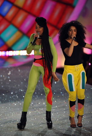 NEW YORK, NY - NOVEMBER 13: Neon Jungle perform on the runway at the 2013 Victoria's Secret Fashion Show at Lexington Avenue Armory on November 13, 2013 in New York City.のeditorial素材