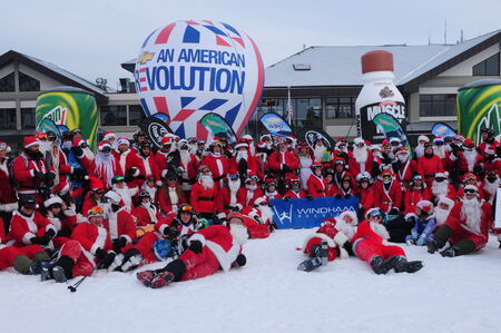 WINDHAM DECEMBER 19 - Skiing and Riding Santas for charity at Windham Mountain. Windham Mountain, Windham NY December 19, 2010のeditorial素材