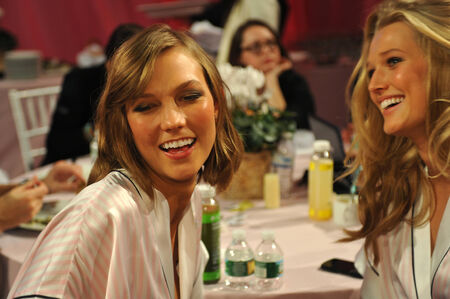 NEW YORK, NY - NOVEMBER 13: Models Karlie Kloss ( L) Toni Garrn (R) making faces for phone snapshots backstage at the 2013 Victoria's Secret Fashion Show at Lexington Avenue Armory on November 13, 2013 in New York City. のeditorial素材