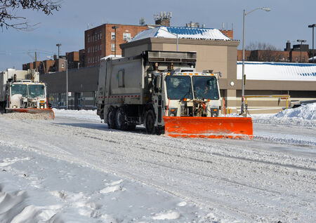 Sanitation tracks cleaning streets in Brooklyn is seen after the seasons first snow storm in NYC