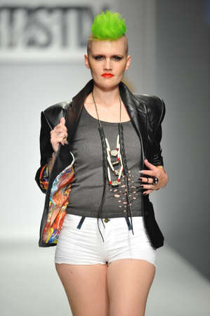 LOS ANGELES, CA - MARCH 11: A model walks runway at Artistix show during Style Fashion Week Fall 2014 at The Live Event Arena on March 11, 2014 in Los Angelesのeditorial素材