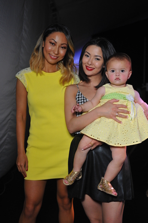 LOS ANGELES, CA - MARCH 11: Designers Kelly Mi Lee and Aida with baby poses backstage at Miss Kinsman Swim/Skinny Bikini show during Style Fashion Week Fall 2014 on March 11, 2014 in LA.
のeditorial素材