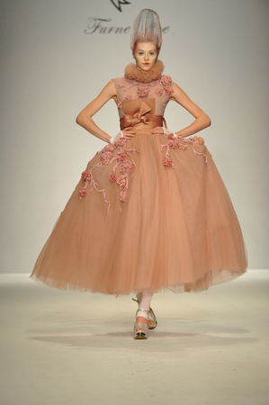 Los Angeles, CA - MARCH 13: A model walks the runway at Furne One fashion show during Style Fashion Week Fall 2014 at The LA Live Event Deck on March 13, 2014 in LA.のeditorial素材