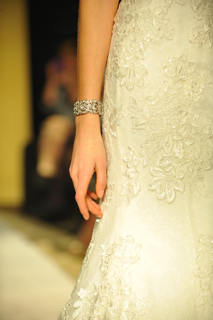 NEW YORK, NY - APRIL 11: A model walks the runway during Oleg Cassini Spring 2015 Bridal collection at the Plaza Athenee on April 11, 2014 in New York City. のeditorial素材