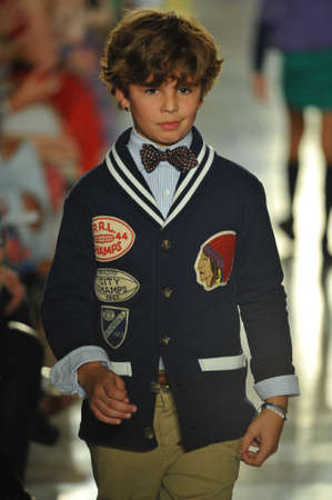 NEW YORK, NY - MAY 19: A model walks the runway at the Ralph Lauren Fall 14 Children's Fashion Show in Support of Literacy at New York Public Library on May 19, 2014 in New York City. のeditorial素材