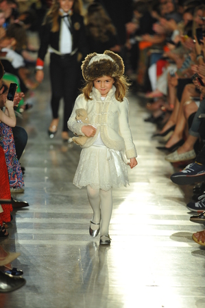 NEW YORK, NY - MAY 19: A model walks the runway at the Ralph Lauren Fall 14 Children's Fashion Show in Support of Literacy at New York Public Library on May 19, 2014 in New York City. のeditorial素材