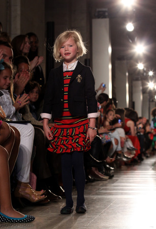 NEW YORK, NY - MAY 19: A model walks the runway at the Ralph Lauren Fall 14 Children's Fashion Show in Support of Literacy at New York Public Library on May 19, 2014 in New York City. のeditorial素材