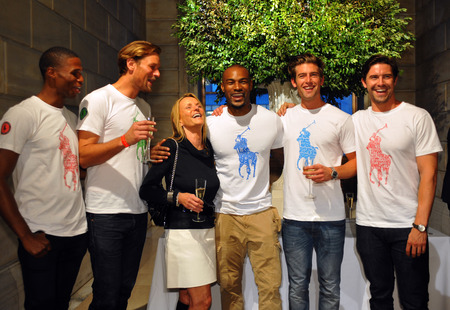 NEW YORK, NY - MAY 19:Tyson Beckford (C) pose with models at the Ralph Lauren Fall 14 Children's Fashion Show in Support of Literacy at New York Public Library on May 19, 2014 in New York City.のeditorial素材