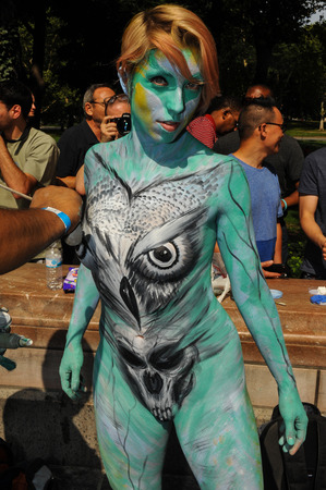 NEW YORK - JULY 26: Nude models, artists take to New York City streets during first official Body Painting Event featuring artist Andy Golub on July 26, 2014 in New York NYのeditorial素材