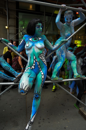 NEW YORK - JULY 26: Nude models, artists take to New York City streets during first official Body Painting Event featuring artist Andy Golub on July 26, 2014 in New York NYのeditorial素材
