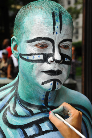 NEW YORK - JULY 26: Nude models, artists take to New York City streets during first official Body Painting Event featuring artist Andy Golub on July 26, 2014 in New York NYのeditorial素材