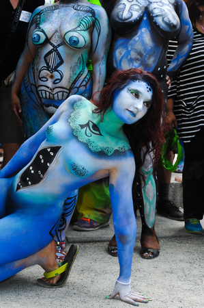 NEW YORK - JULY 26: Nude models, artists take to New York City streets during first official Body Painting Event featuring artist Andy Golub on July 26, 2014 in New York NYのeditorial素材