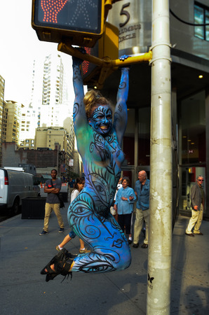 NEW YORK - JULY 26: Nude models, artists take to New York City streets during first official Body Painting Event featuring artist Andy Golub on July 26, 2014 in New York NYのeditorial素材