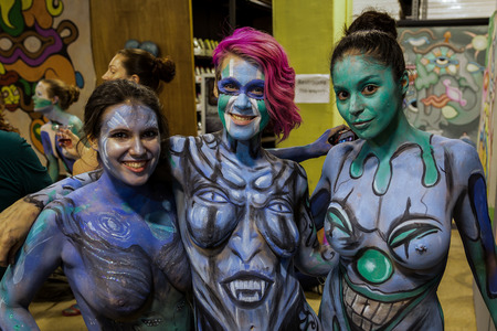 NEW YORK - JULY 26: Nude models, artists take to New York City streets during first official Body Painting Event featuring artist Andy Golub on July 26, 2014 in New York NY のeditorial素材