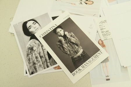 NEW YORK - SEPTEMBER 03: Models compcards backstage for Victor de Souza Spring Summer 2015 presentation during New York Fashion Week on September 03, 2014 in NYC.のeditorial素材