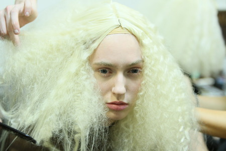 NEW YORK - SEPTEMBER 03: A model getting ready backstage for Victor de Souza Spring Summer 2015 presentation during New York Fashion Week on September 03, 2014 in NYC.
のeditorial素材