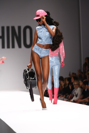 MILAN, ITALY - SEPTEMBER 18: A model walks the runway during the Moschino show as part of Milan Fashion Week Womenswear Spring/Summer 2015 on September 18, 2014 in Milan, Italy.のeditorial素材