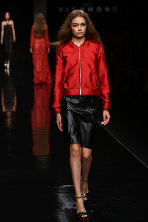 MILAN, ITALY - SEPTEMBER 21: A model walks the runway during the John Richmond show as part of Milan Fashion Week Womenswear Spring 2015 on September 21, 2014 in Milan, Italy.のeditorial素材