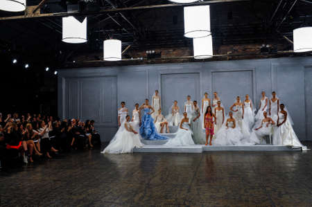 NEW YORK, NY - APRIL 11: Designer Monique Lhullier and models pose during the Monique Lhullier Spring 2015 Bridal collection show at on April 11, 2014 in New York City.のeditorial素材