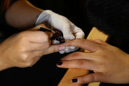 MILAN, ITALY - SEPTEMBER 20: A model gets ready backstage before the Genny fashion show as part of Milan Fashion Week Womenswear Spring-Summer 2015 on September 20, 2014 in Milan, Italy.のeditorial素材