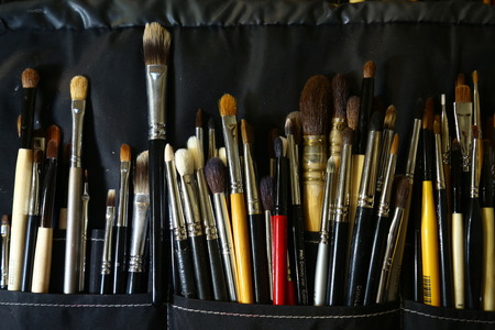 MILAN, ITALY - SEPTEMBER 20: Make-up kit with brushes during the Mila Schon backstage as part of Milan Fashion Week Womenswear Spring-Summer 2015 on September 20, 2014 in Milan, Italy.のeditorial素材