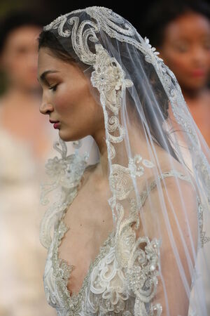 NEW YORK, NY - OCTOBER 10: Models walk the runway finale during the Claire Pettibone Fall 2015 Bridal Collection Show on October 10, 2014 in New York City.のeditorial素材
