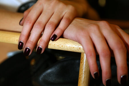 MILAN, ITALY - SEPTEMBER 20: A model gets ready backstage before the Genny fashion show as part of Milan Fashion Week Womenswear Spring-Summer 2015 on September 20, 2014 in Milan, Italy.のeditorial素材