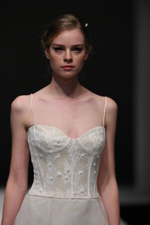 NEW YORK, NY - OCTOBER 12: A model walks the runway at the Jenny Lee Fall 2015 Bridal collection...
