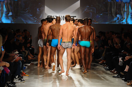 NEW YORK, NY - OCTOBER 21: Models walk the runway finale during 2(X)IST Men's Spring/Summer 2015 Runway Show on October 21, 2014 in New York City.のeditorial素材